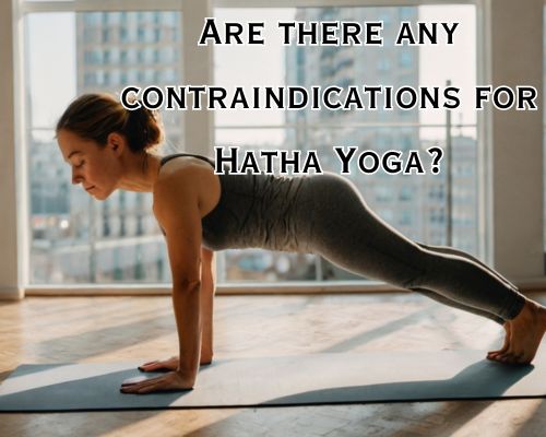 a woman doing hatha yoga calmly